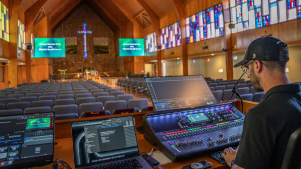 Operator at the digital console in the St. John's Lutheran tech booth