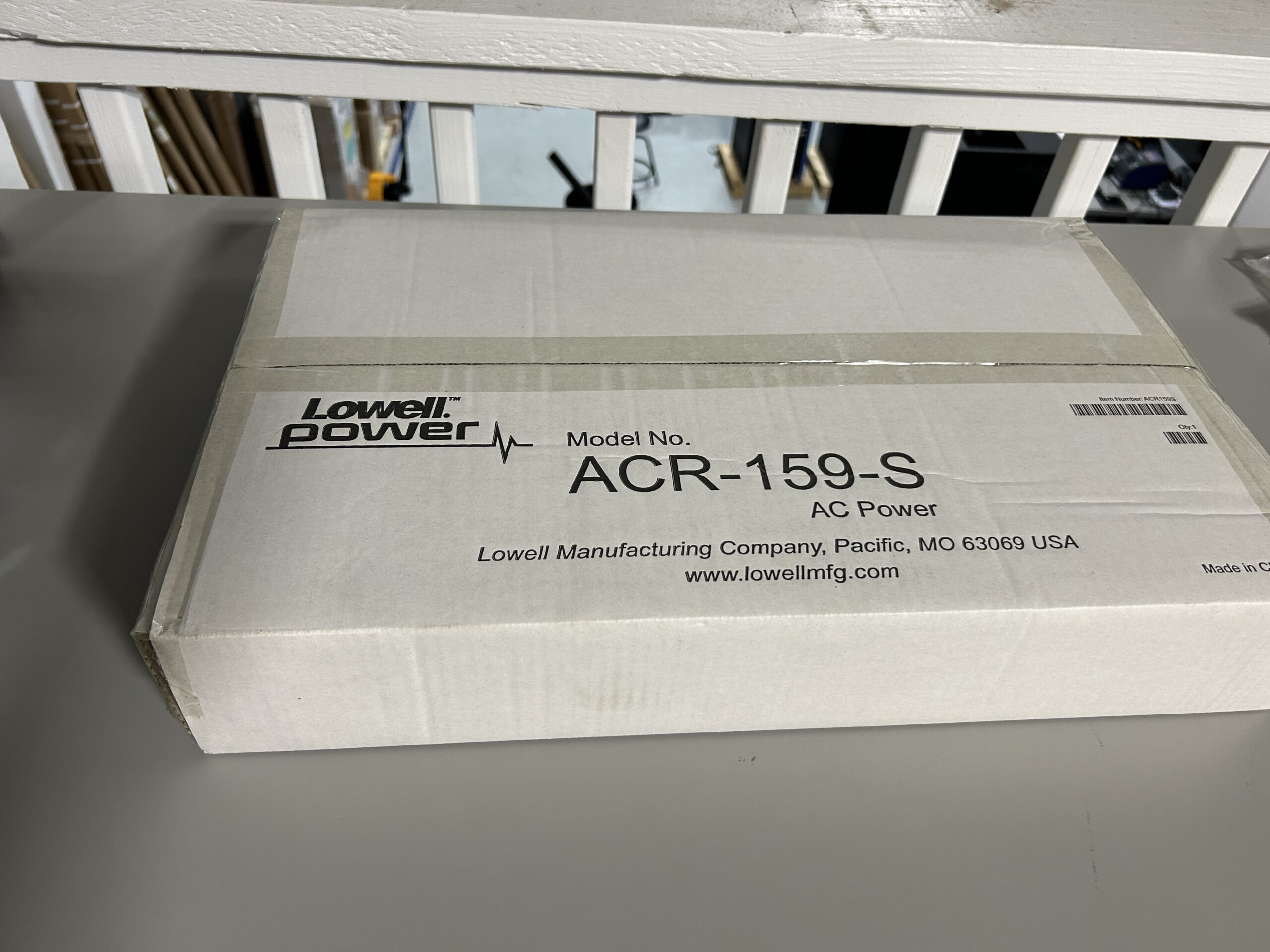 Lowell ACR-159-S 9-outlet rackmount AC power panel in its labeled shipping box
