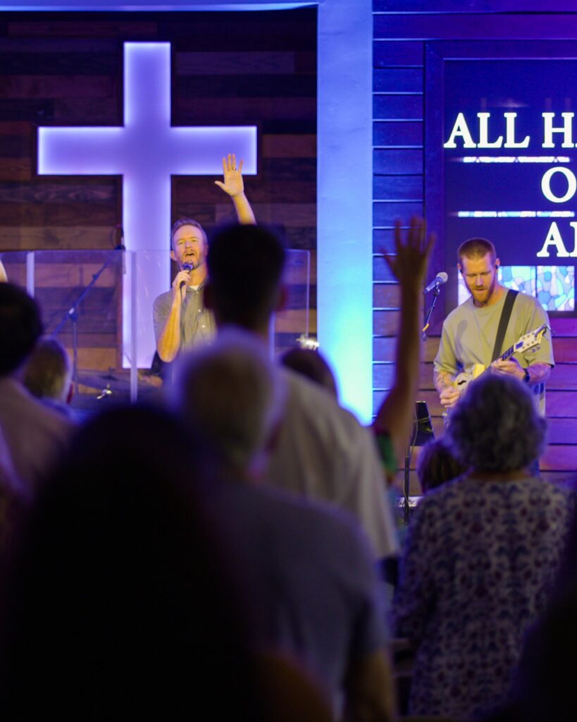 Worship leaders lit by front light and wall uplighting at Agoura Bible Fellowship