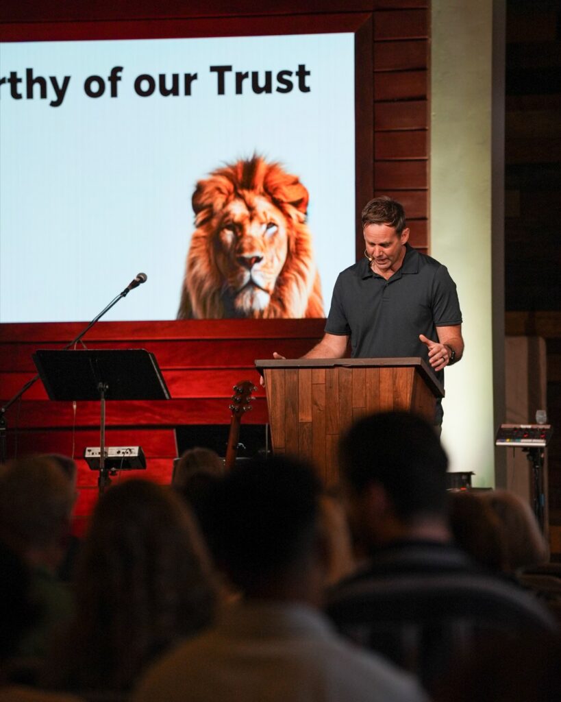 Pastor teaching in front of an LED center screen at Agoura Bible Fellowship