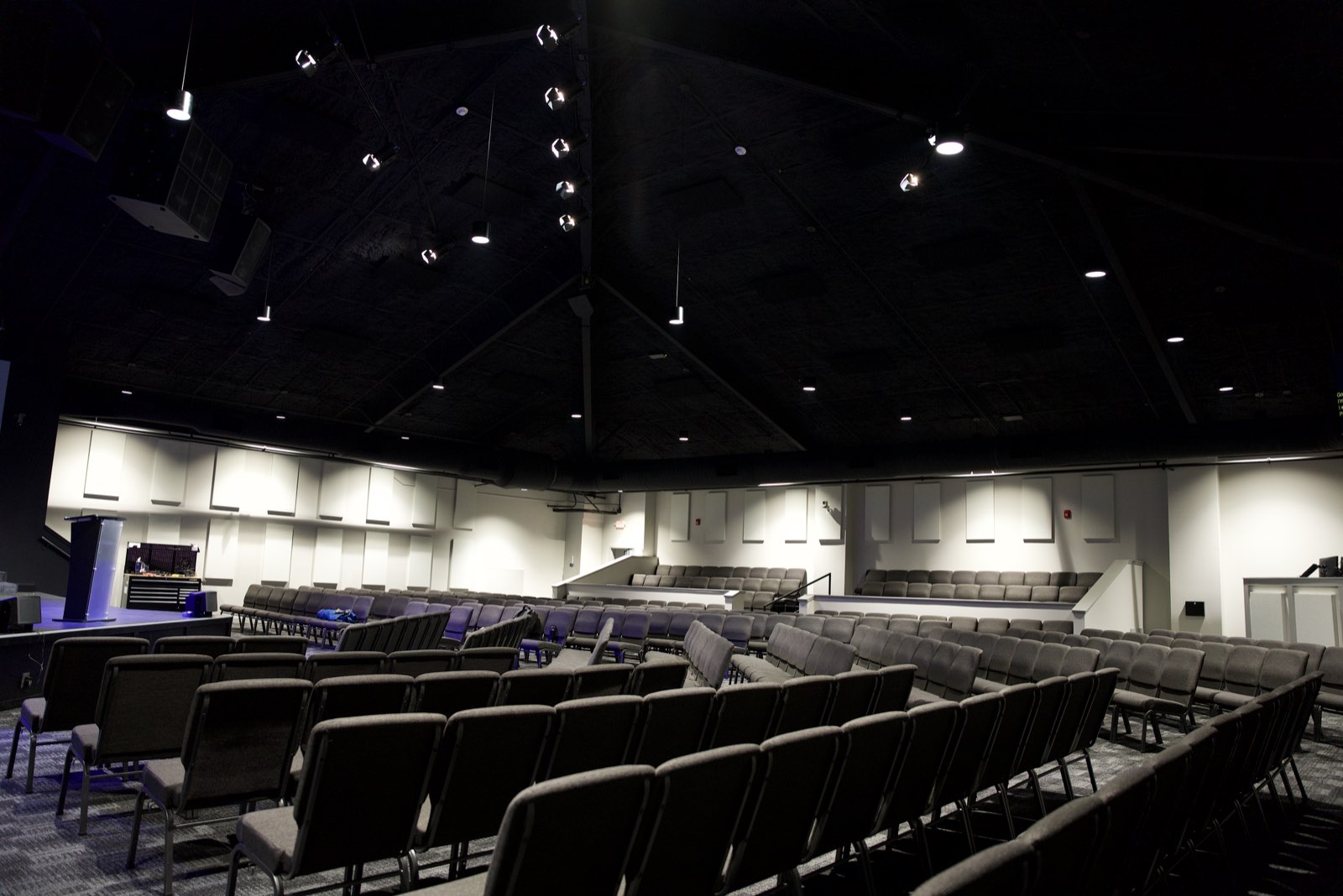 Side seating section at Faith Covenant Church of God with acoustic panels along the walls