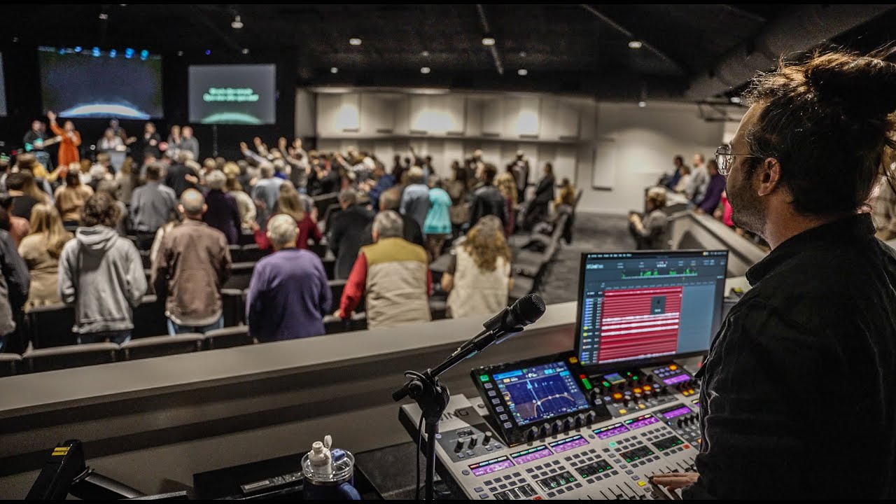 The Faith Covenant congregation during a service, seen from the front of house console