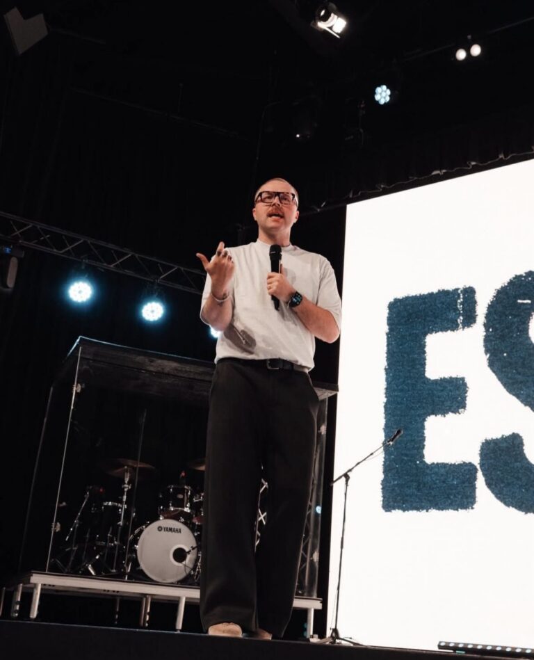 Jon Rush speaking on stage, Churchfront Conference 2026 keynote speaker