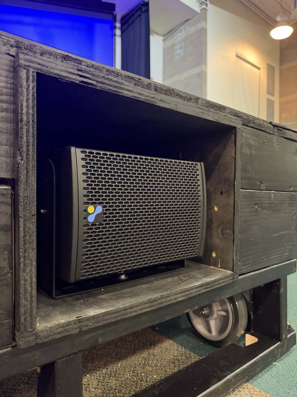 Fulcrum Acoustic RX6 front fill loudspeaker built into the movable stage thrust at North Metro Church
