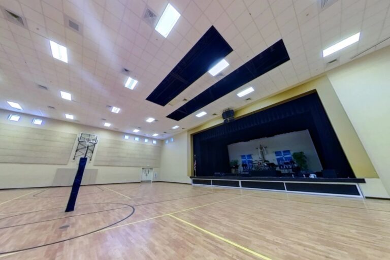 The Palm City family life center before the upgrade, a daylit gymnasium
