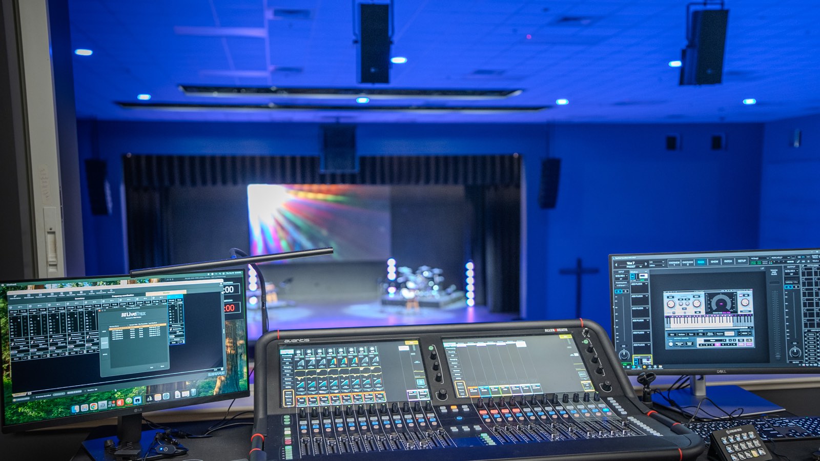 Digital mixing console at front of house facing the stage at Palm City Presbyterian