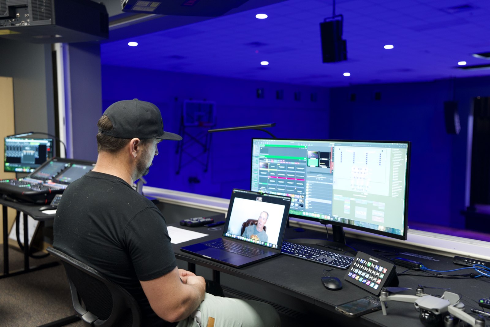 Volunteer running cameras, switching and the livestream from the production desk at Palm City Presbyterian