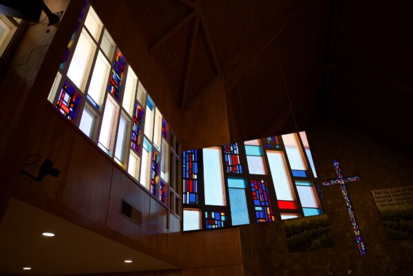 St. John's Lutheran Church sanctuary with timber ceiling and stained glass