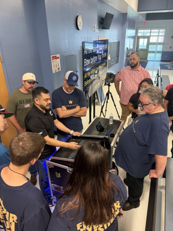 A Churchfront engineer walking a church tech team through a new console