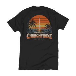 Back of the black Churchfront Space Coast Sunset Tee: a rocket launch through a striped orange sunset over the ocean, framed by palms, with Churchfront and Melbourne, FL below
